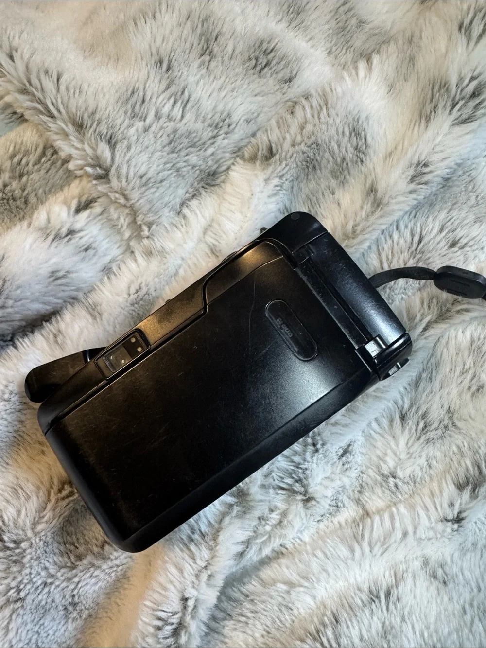 Olympus compact film camera in black with built-in flash